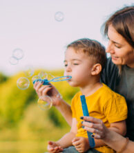 Mother and son on lake